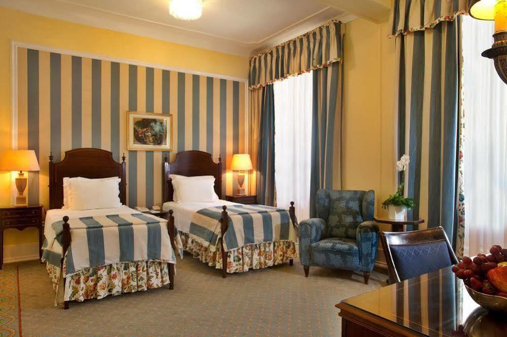 Hotel Avenida Palace Lisboa Exteriér fotografie A room at the hotel