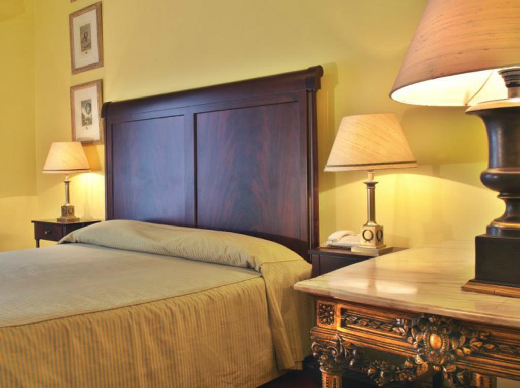 Hotel Avenida Palace Lisboa Pokoj fotografie A bedroom at the hotel